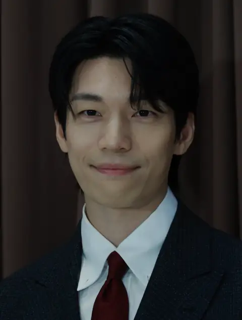 Head shot of Wi smiling