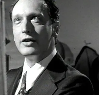 A black-and-white photograph of Paul Lazar