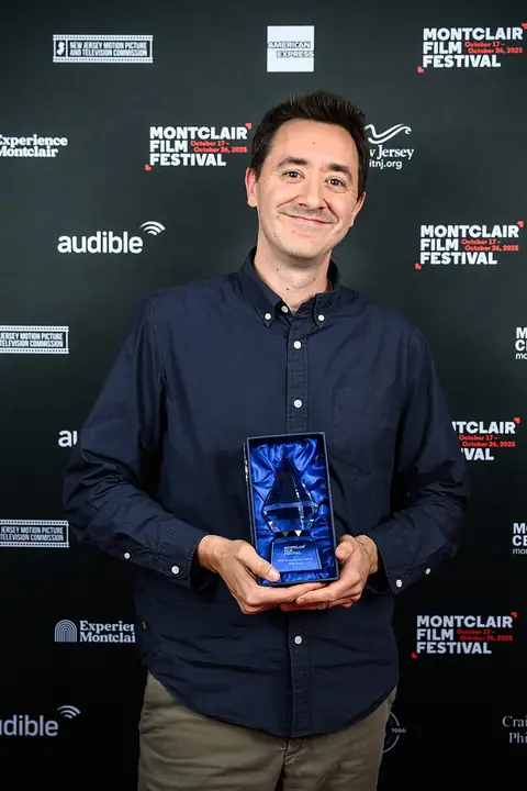 Will Tracy at Montclair film festival holding award 3.jpg